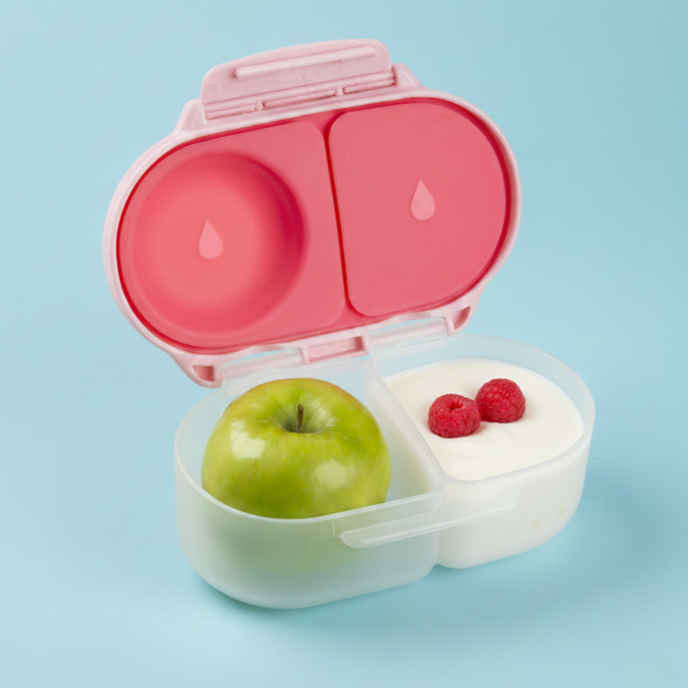 b.box snackbox snack container for kids lifestyle photo with little girl showing off her treats