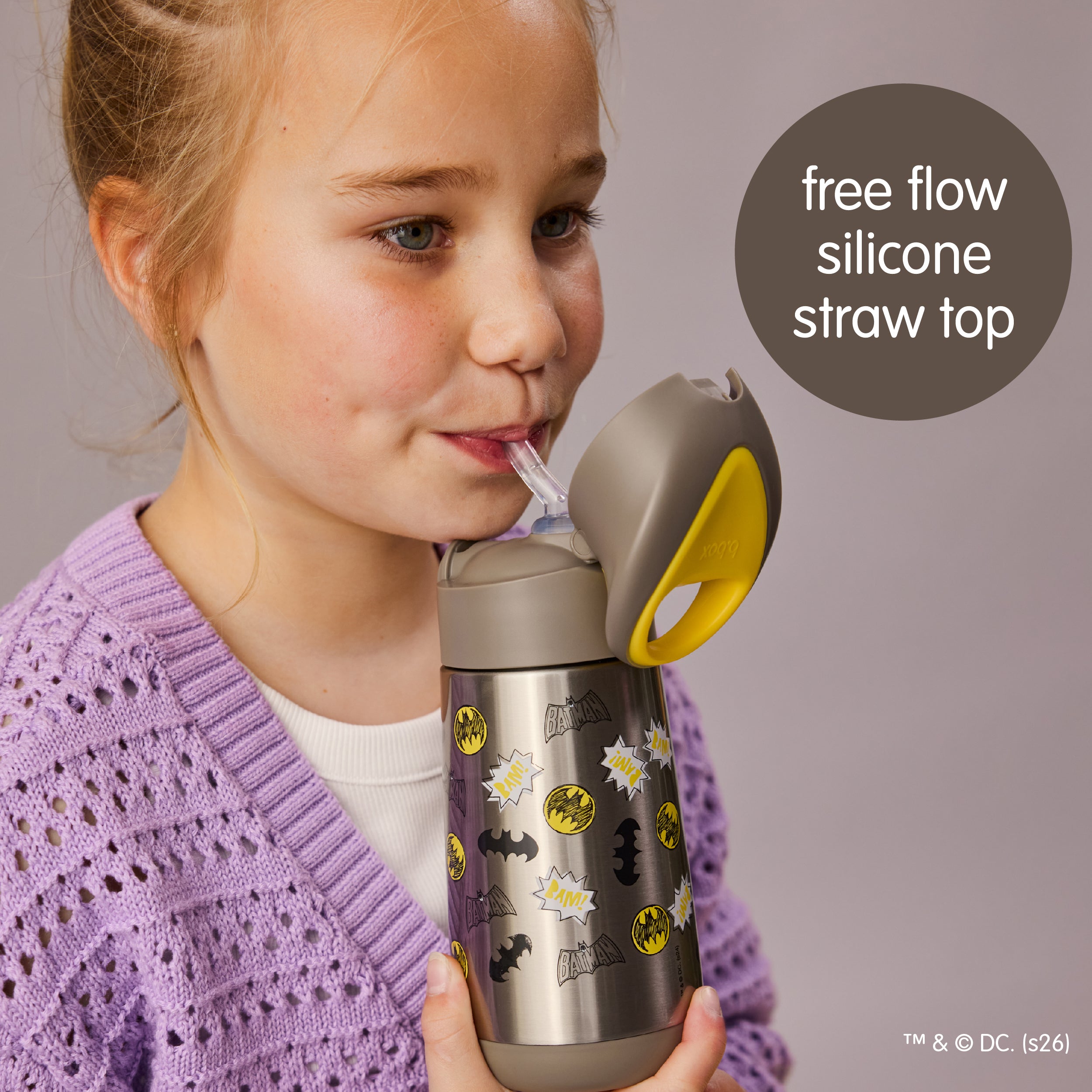 A stainless steel insulated drink bottle with yellow and gray Batman themed accents, featuring a user-friendly carry handle and child-friendly push-button opening.